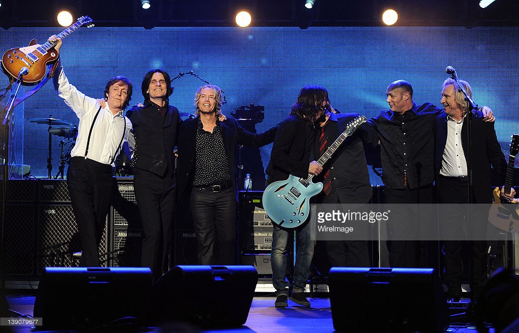Honoree Sir Paul McCartney, Rusty Anderson, Brian Ray, Dave Grohl, Abe Laboriel Jr., Paul (Wix) Wickens and Joe Walsh perform onstage during The 2012 MusiCares Person of The Year Gala Honoring Paul McCartney at Los Angeles Convention Center on February 10, 2012 in Los Angeles, California.